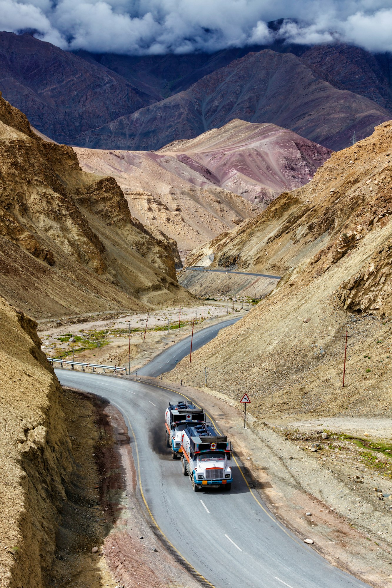 Indian lorry trucks on highway in Himalayas. Ladakh, India